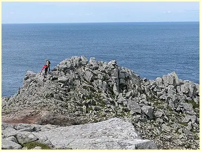 Felskletterer an der Pointe du Raz